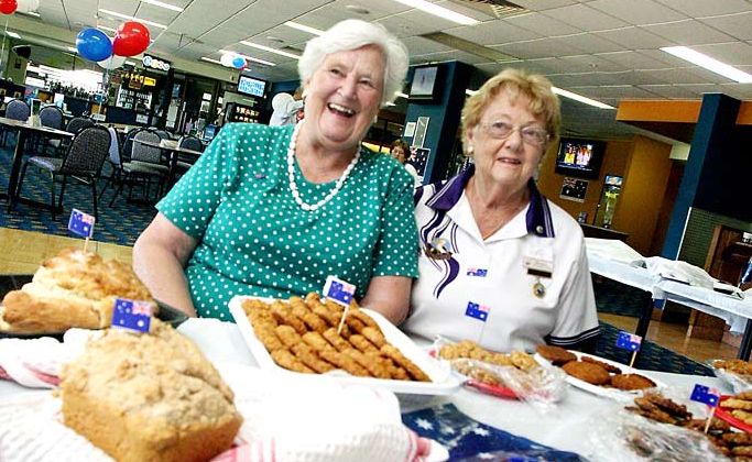 ANZAC biscuit and damper-making competition judge Shirley Gill and Pottsville Bowls Club president Heather Woodridge. D103851