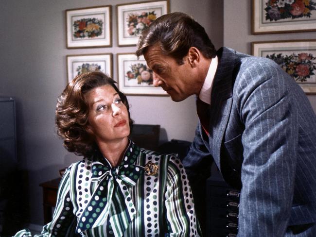 Flirty business ... Lois Maxwell as Moneypenny, with Roger Moore’s James Bond.