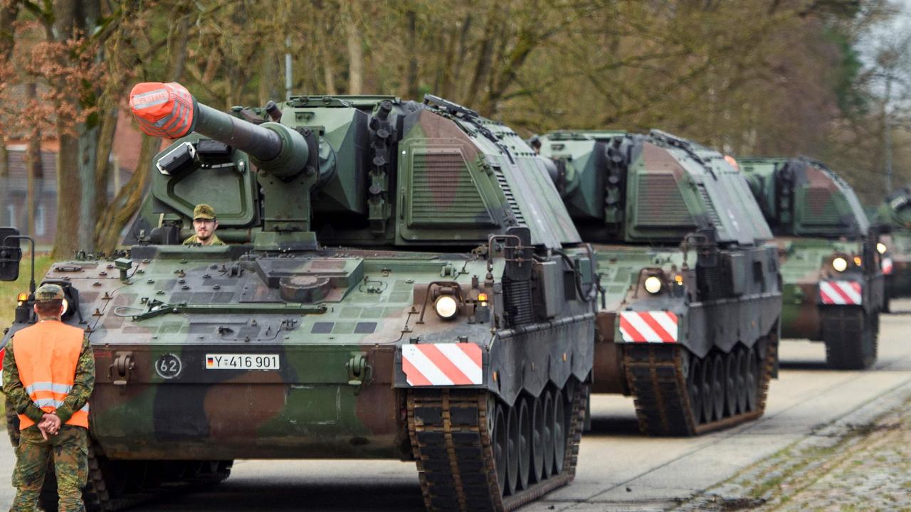 Tanks with mounted howitzers of the German armed forces Bundeswehr are driven to the loading area in the Hindenburg barracks in Munster, northern Germany. Germany sent seven self-propelled howitzers to Ukraine. Picture: Gregor Fischer / AFP.