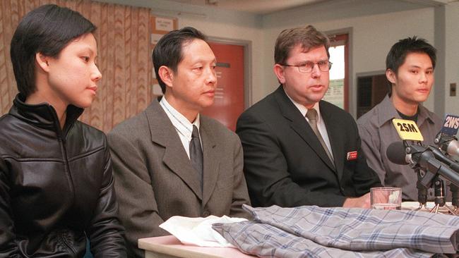 Police inspector Brad Cox with Sam Diec, his son Sunny and daughter Tina during a press conference  in July 2000. Picture: Stephen Cooper