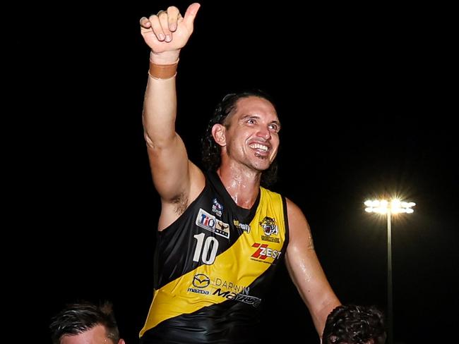 Cam Ilett is carried off after his last game for the Nightcliff Tigers at Nightcliff Oval in Round 18 of the 2024-25 NTFL season. Picture: Celina Whan / AFLNT Media