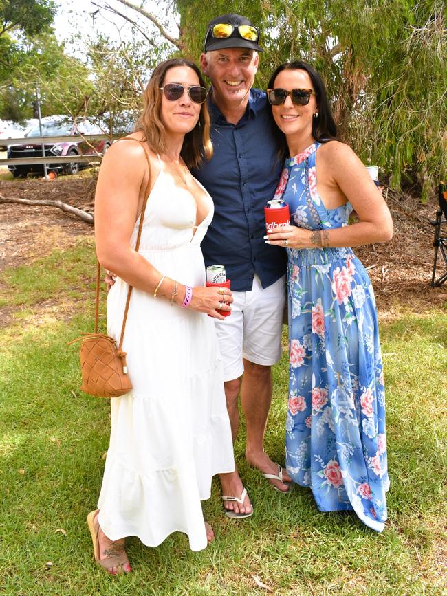 Cassandra Pullen, Steve Laing and Kaz Laing having an action-packed day at the Ladbrokes Stony Creek Cup on Sunday, March 09, 2025. Picture: Jack Colantuono