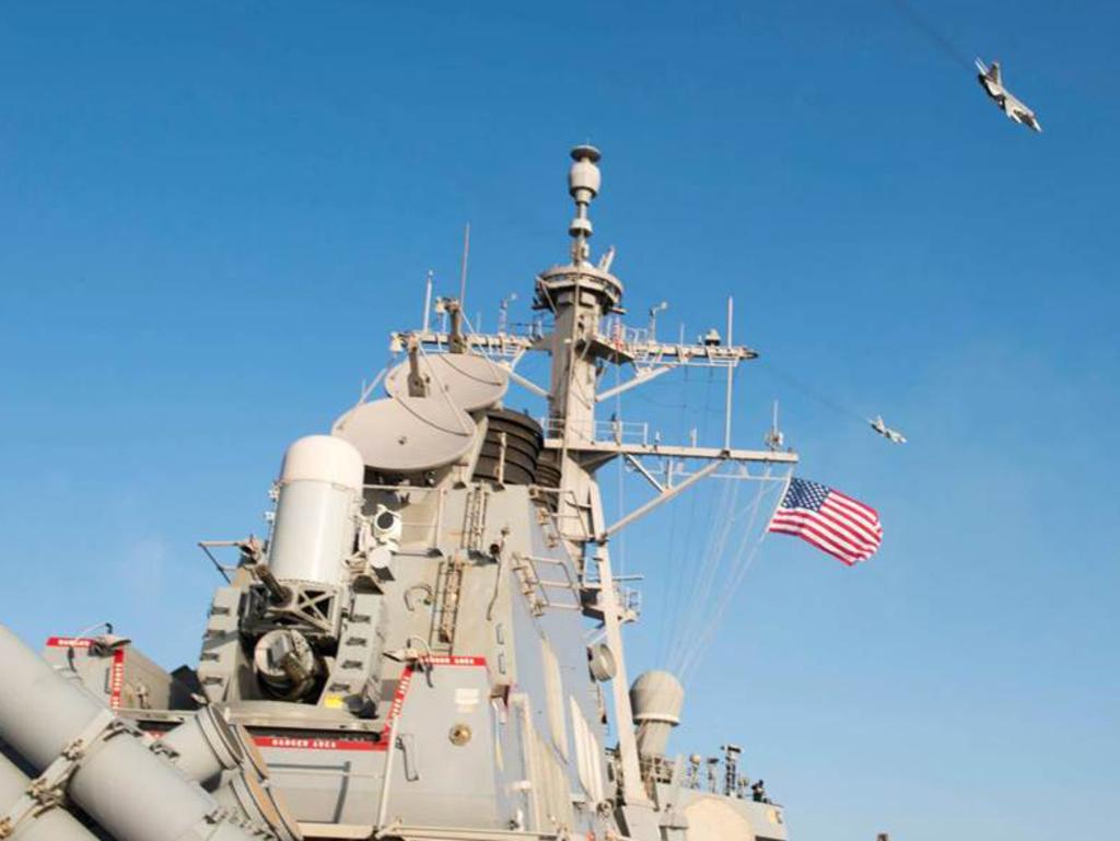 In this handout photo provided by the US Navy, Two Russian Sukhoi Su-24 attack aircraft fly over the USS Donald Cook on April 12, 2016. Picture: US Navy