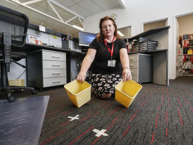 Frustrated teacher Victoria Lemmer at the site of a chronic water leak. Picture: Valeriu Campan