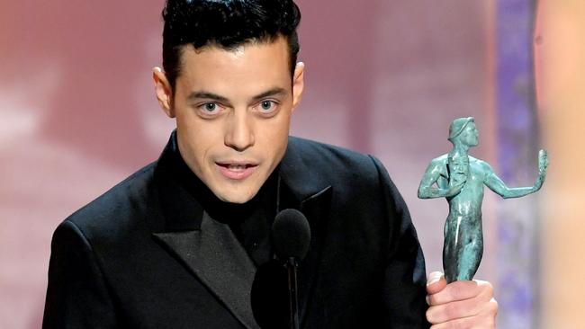 Rami Malek accepts Outstanding Performance by a Male Actor in a Leading Role for "Bohemian Rhapsody" at the 25th Annual Screen Actors Guild Awards (Photo by Kevin Winter/Getty Images for Turner)