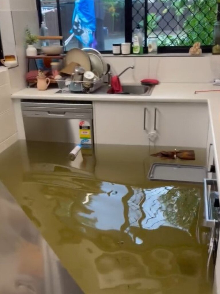 A Holloways Beach family has had their home all but gutted as they claim floodwaters caught them by surprise on Monday afternoon. Picture: Supplied