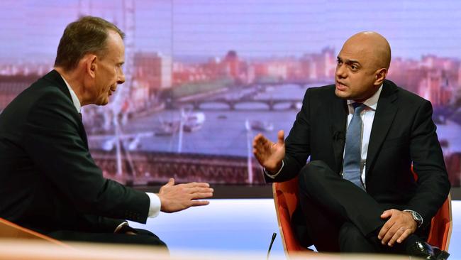 Britain's Chancellor of the Exchequer Sajid Javid speaks to British journalist Andrew Marr during an appearance on the BBC political program The Andrew Marr Show.