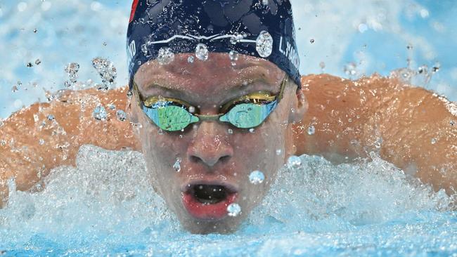 France's Leon Marchand competes in  a semifinal of the men's 200m individual medley swimming event during the Paris 2024 Olympic Games at the Paris La Defense Arena in Nanterre, west of Paris, on August 1, 2024. (Photo by Oli SCARFF / AFP)