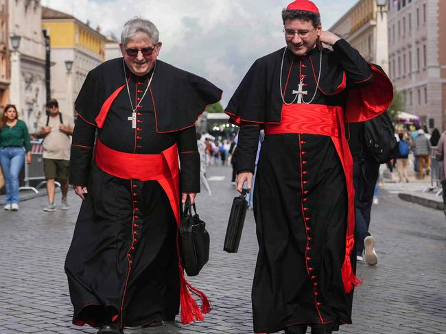 Canadian cardinals Thomas Christopher Collins (left) and Francis Leo walk on Via della Conciliazione near The Vatican in Rome on Monday. The world’s 133 cardinals begin the selection for the next pope tonight. Picture: Dimitar Dilkoff/AFP