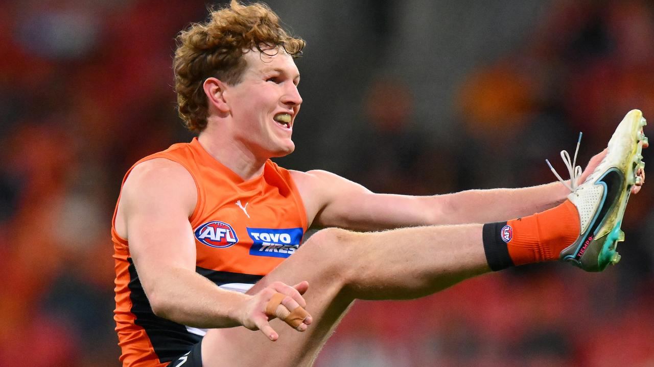 SYDNEY, AUSTRALIA - AUGUST 19: Tom Green of the Giants kicks the ball during the 2023 AFL Round 23 match between the GWS GIANTS and the Essendon Bombers at GIANTS Stadium on August 19, 2023 in Sydney, Australia. (Photo by Morgan Hancock/AFL Photos via Getty Images)