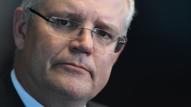 Federal Treasurer Scott Morrison speaks to the media in Melbourne, Thursday, April 5, 2018. The Treasurer was meeting with his state counterparts regarding the GST distribution. (AAP Image/Julian Smith) NO ARCHIVING