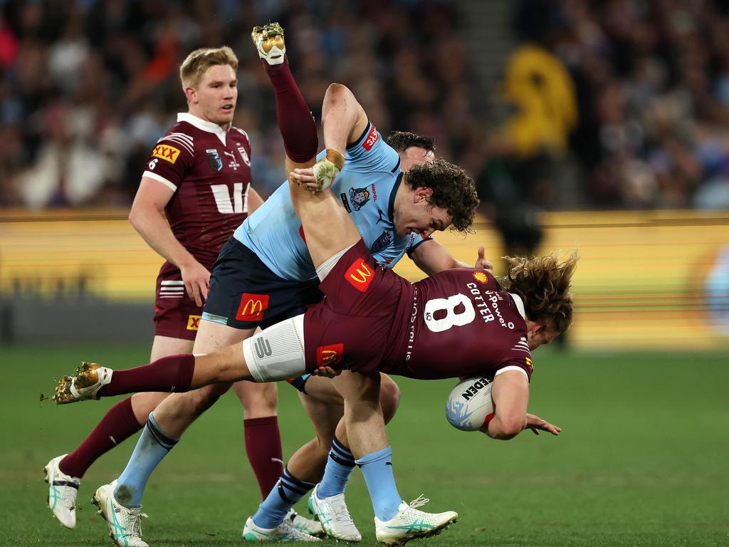 Liam Martin was lucky to escape sanction for this tackle on Reuben Cotter. Picture: Mark Stewart