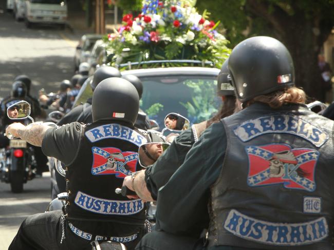 Rebels wear their patches teamed with a sea of black shirts and pants.