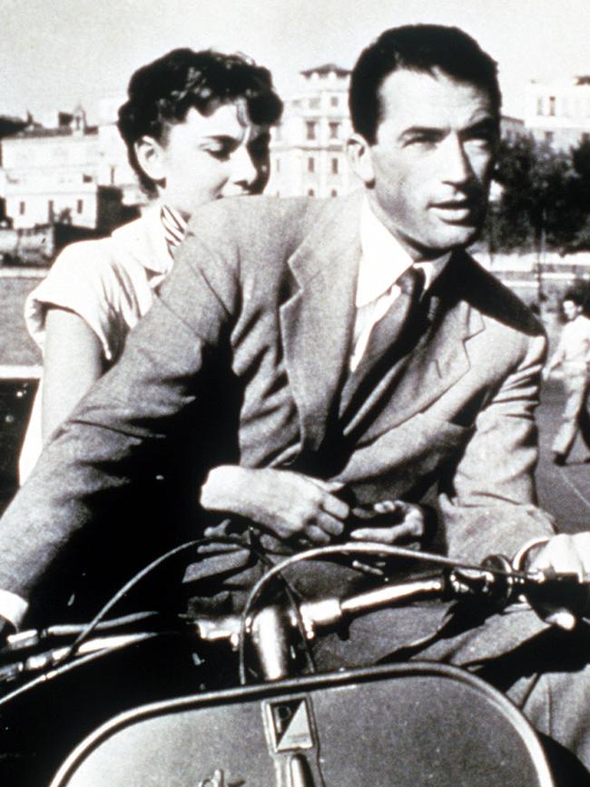 Gregory Peck with Audrey Hepburn in Roman Holiday.