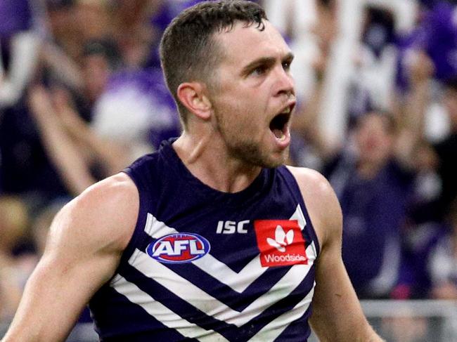 Hayden Ballantyne of the Dockers celebrates kicking a goal during the Round 8 AFL match between the Fremantle Dockers and the St Kilda Saints at Optus Stadium in Perth, Saturday, May 12, 2018. (AAP Image/Richard Wainwright) NO ARCHIVING, EDITORIAL USE ONLY