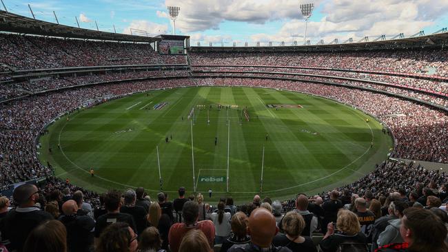 The Anzac Day match at the MCG was full of maskless fans, standing shoulder-to-shoulder, and a far cry from the lockdowns of last year. Picture: Michael Klein