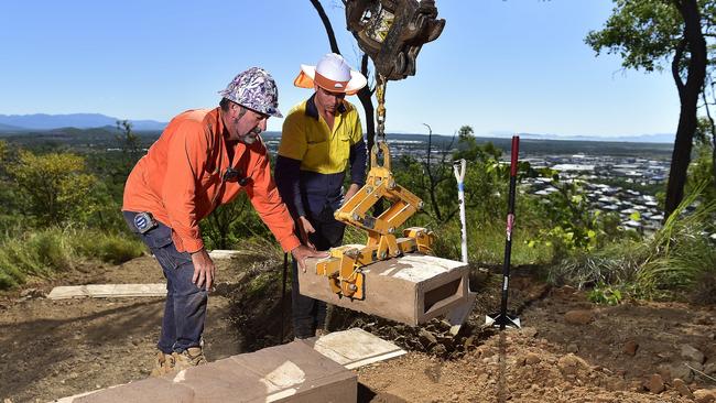 Labourer Harrison Dempsey and leading hand Rodney Wood installing new steps. JMAC crews have been hard at work as Mount Louisa walking trails start to take shape. PICTURE: MATT TAYLOR.