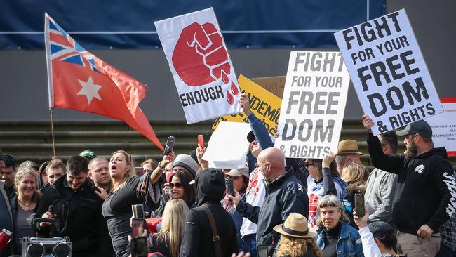 Anti-vaccine protesters outside Parliament House in Melbourne. Picture: Ian Currie