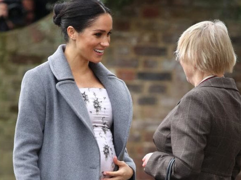 A very pregnant Meghan Markle at Brinsworth House on Tuesday.