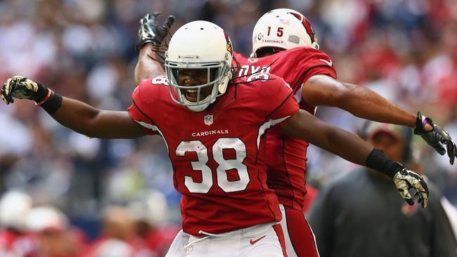 Andre Ellington celebrates his touchdown with Michael Floyd.