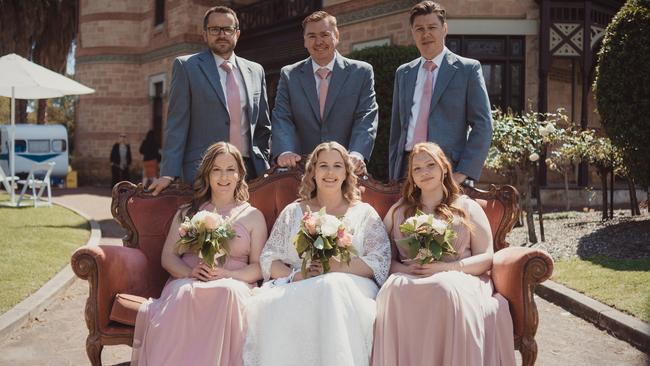 Mr and Mrs Burford with their bridal party. Picture: Dan Glasgow