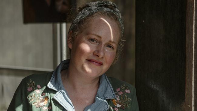 EMBARGO FOR TWAM, 10 MAY 2025. FEE MAY APPLY. Cosy Gothic novelist, and mother of 10, Christina Baehr in her writing shed, at home in Tasmania. Photo: Naomi Mackie / Billy Button Photography