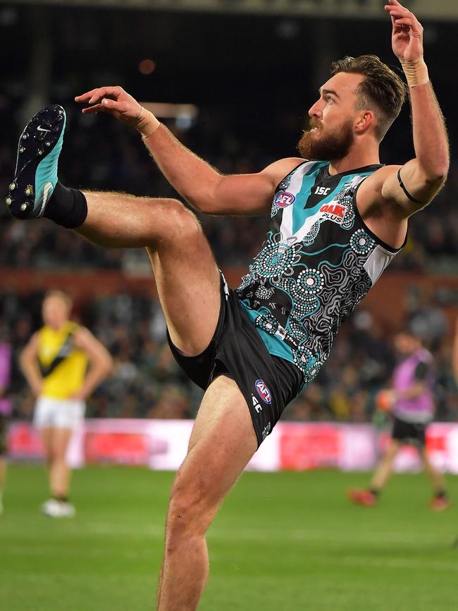 Charlie Dixon has a shot for goal against Richmond on Friday. Picture: Daniel Kalisz/Getty Images