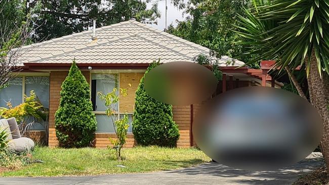 A residence on Edith Court in Belmont with boarded up windows.