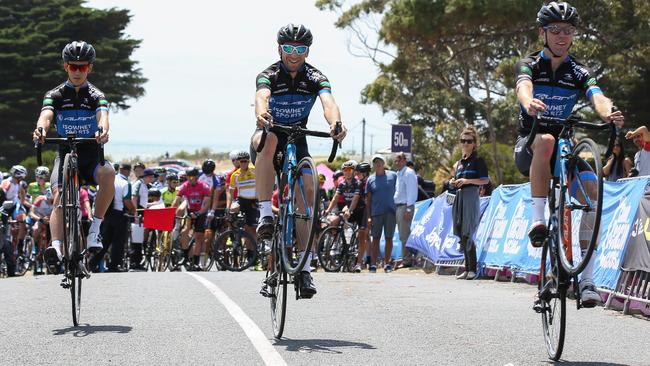 Three of the Avanti IsoWhey Sports team show off with a wheely at the Mitchelton Bay Cycling Classic at Portalington , Victoria, Australia, Sunday, January, 2016. Con Chronis