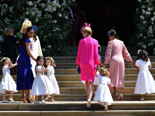 The kids make their way into St George’s Chapel. Picture: Getty Images