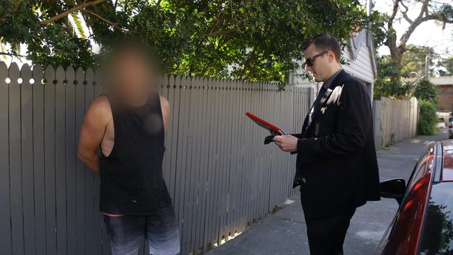 Northern Beaches detectives have withdrawn one serious charge against an alleged ‘flasher’, but Lindsay Moody, of Frenchs Forest, pictured here while being arrested in September, is still facing court on 51 offences involving 28 different women over a period of close to two years. Picture: NSW Police