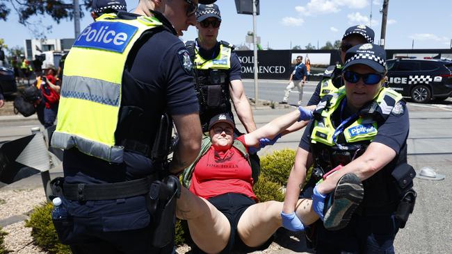 According to reports from the scene, some protesters were ‘aggressively dragged’. Picture: AAP Image/Con Chronis