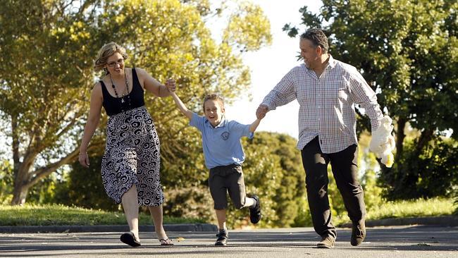  Croydon family Geoff and Fiona Smith enjoy some time out at home with their son Riley. 