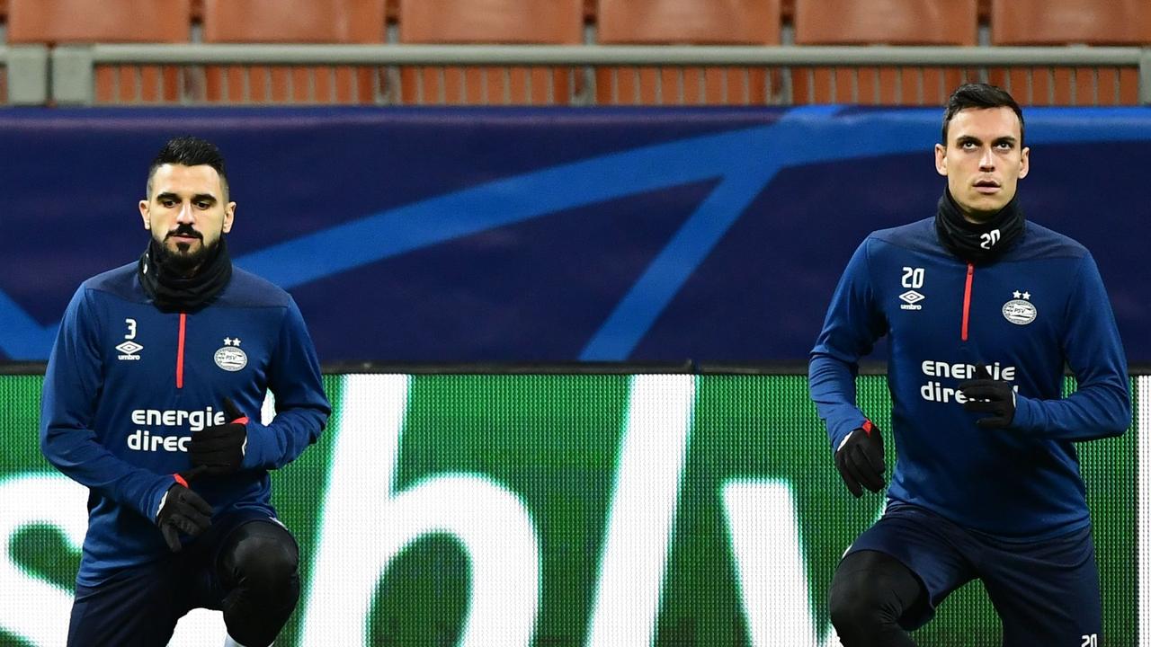 Australian defenders Aziz Behich and Trent Sainsbury 