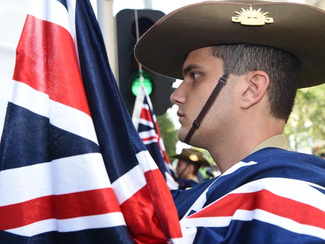 Victoria’s flag raising ceremony is followed by the vibrant Australia Day Parade and sees thousands of people line Swanston Street each year. Picture: Tony Gough