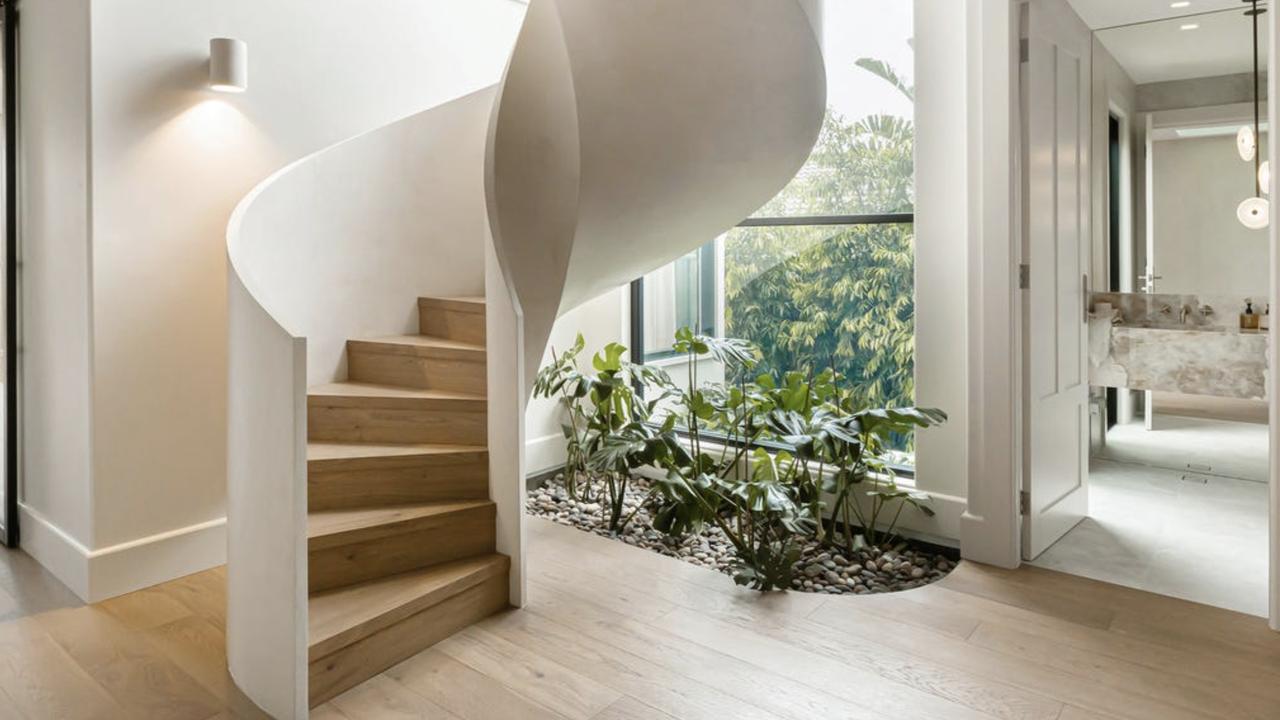 A grand stairwell inside the Long Getty property.