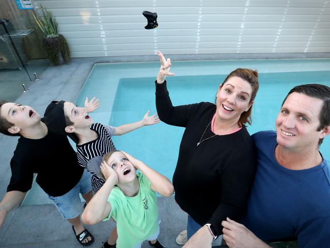 The Davidson family. Frustrated by months of tantrums, rule-breaking, and power struggles over Fortnite, father Chad threw their new Xbox console in the pool. Picture: Jamie Hanson