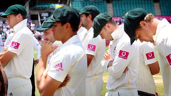 Nowhere to hide...Australia's players watch on as England celebrate the Ashes win at the SCG. Picture: Gregg Porteous