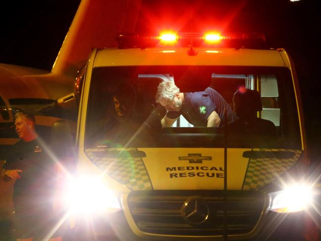 An ambulance waiting for Alex Shorey to get off the flight at Brisbane Airport. Picture: David Clark