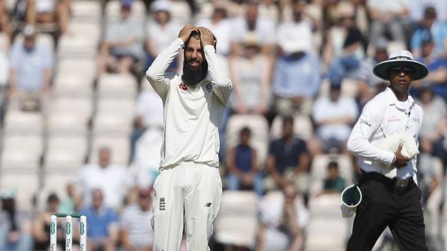 England's Moeen Ali reactsafter bowling to India's Ajinkya Rahane during play on the fourth day of the 4th cricket test match between England and India at the Ageas Bowl in Southampton, England, Sunday, Sept. 2, 2018. England and India are playing a 5 test series. (AP Photo/Alastair Grant)