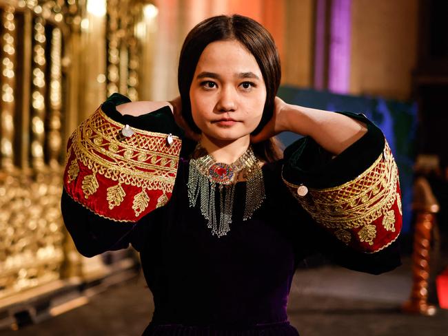 Nila Ibrahimi, a 17-year-old Afghanistan-native girls' right activist, poses during an interview after winning the KidsRights International Children's Peace Prize during a ceremony at De Nieuwe Kerk, in Amsterdam, on November 19, 2024. (Photo by Simon Wohlfahrt / AFP)