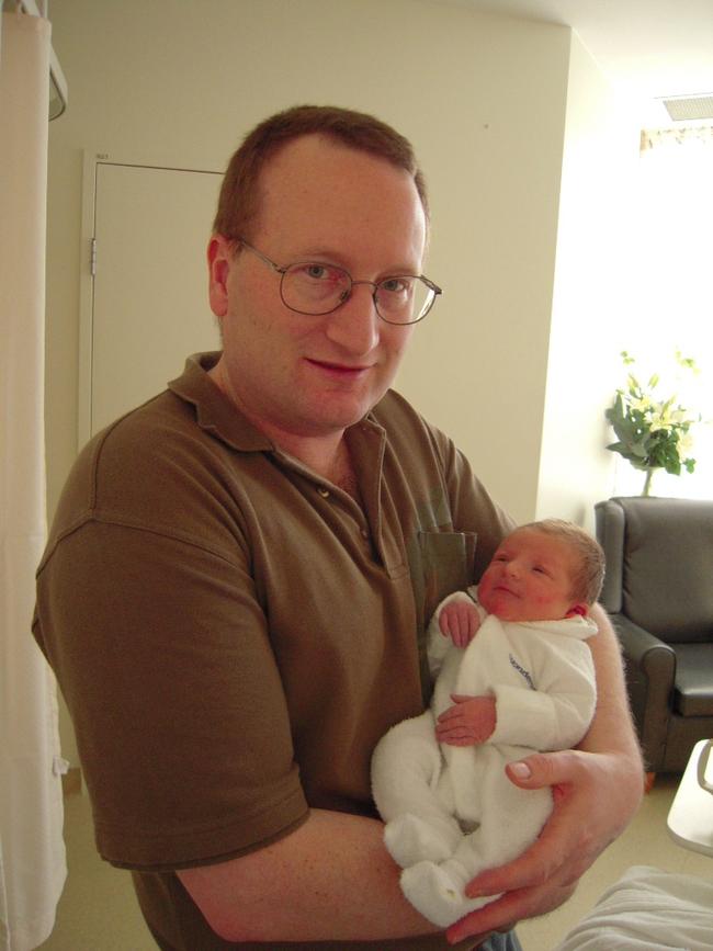 Clare, now 15, was born at Hobart Private Hospital in 2009, with dad Chris Ferguson pictured holding her. Picture: Sarah Hood.