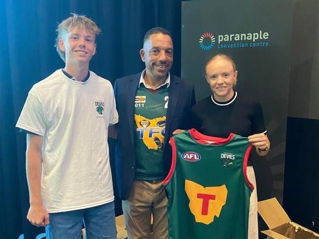 Wynyard Cats president Kent Jackson with Cats young player Jonty Dixon and recently-retired AFLW player Emma Humphries at one of the launch sites for Tasmania Football Club last month. Picture:Wynyard Cats