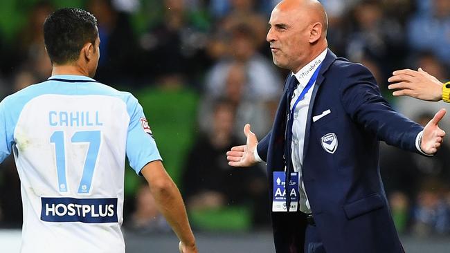 MELBOURNE, AUSTRALIA - OCTOBER 25: Tim Cahill of the City and Kevin Muscat the coach of the Victory exchange words during the FFA Cup Semi Final match between Melbourne City FC and Melbourne Victory at AAMI Park on October 25, 2016 in Melbourne, Australia. (Photo by Quinn Rooney/Getty Images)