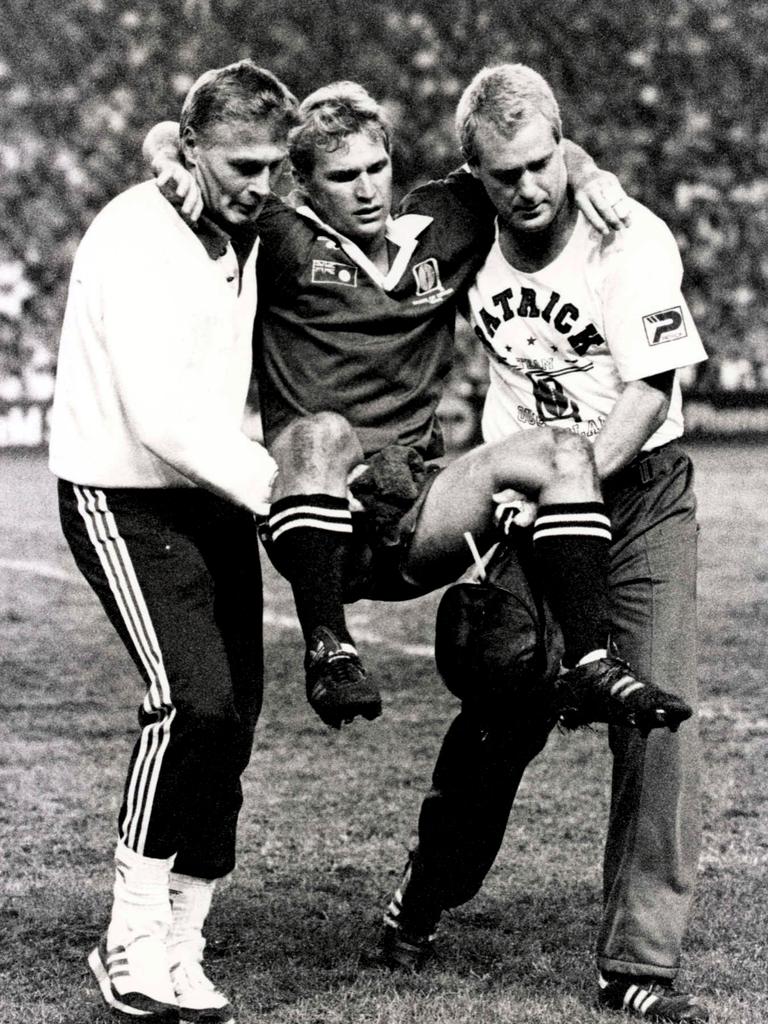 Alfie Langer was carried of with a broken leg as Queensland won a the 1989 Origin series 2-1.