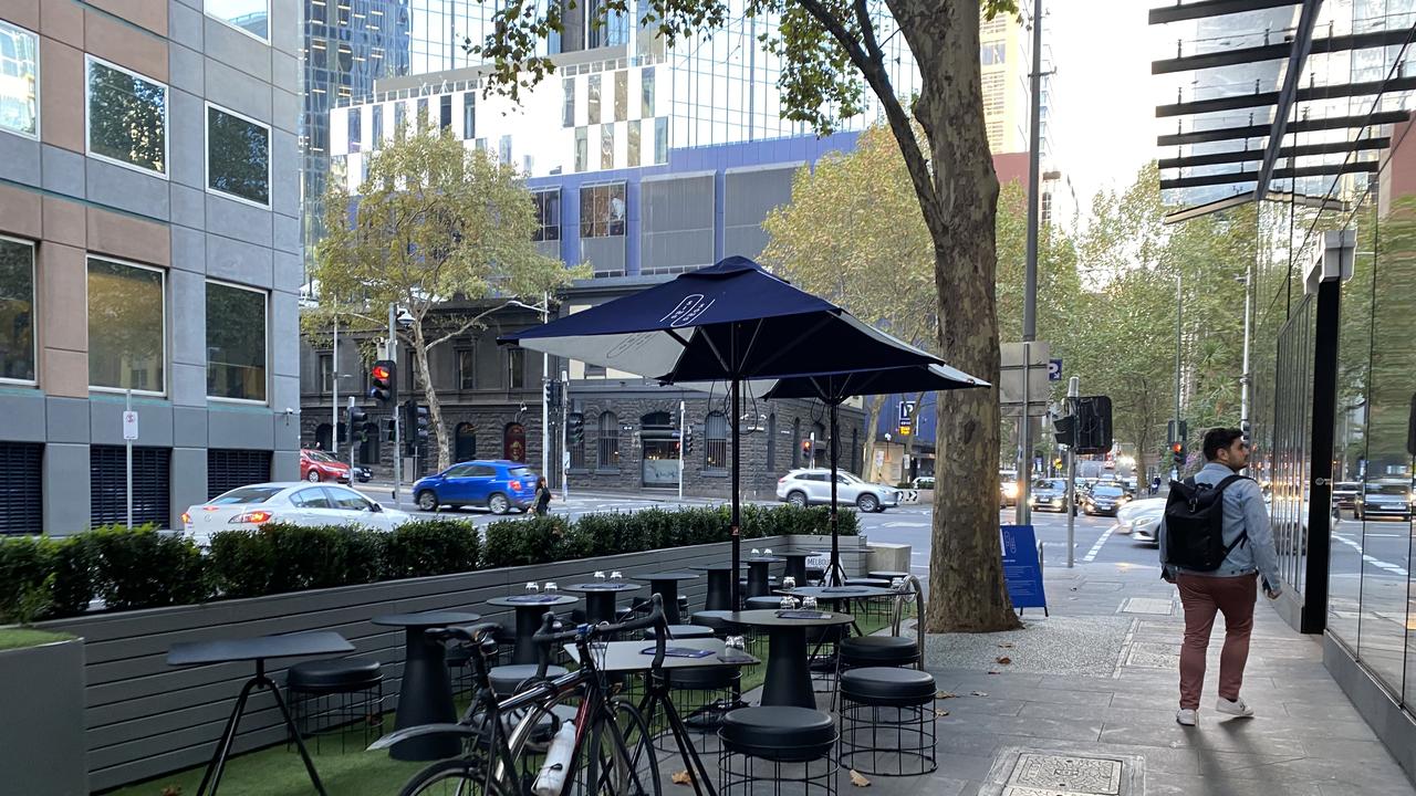 You can soak up the sun and have a glass of wine at the Quincy Hotel’s street dining, Melbourne. Picture: Grace McKinnon