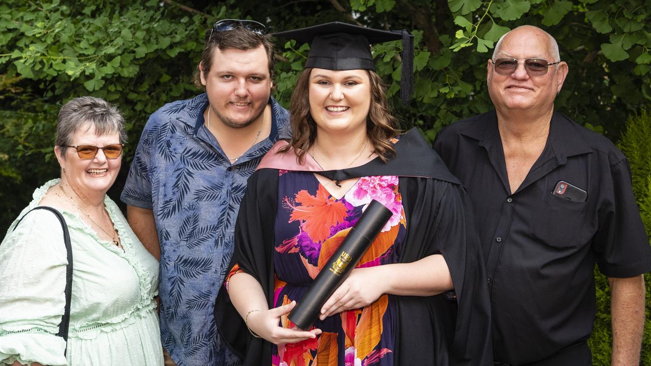 Bachelor of Education (Secondary) graduate Brooke Wessling with family (from left) Bev, Dwight and John Wessling at the UniSQ graduation ceremony at Empire Theatres, Tuesday, December 13, 2022. Picture: Kevin Farmer