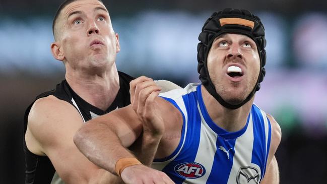 MELBOURNE, AUSTRALIA - JUNE 16: Tristan Xerri of the Kangaroos and Darcy Cameron of the Magpies contest the ruck during the round 14 AFL match between North Melbourne Kangaroos and Collingwood Magpies at Marvel Stadium, on June 16, 2024, in Melbourne, Australia. (Photo by Daniel Pockett/Getty Images)