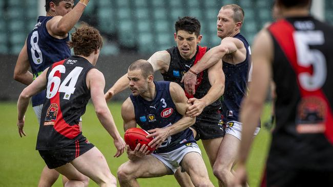 TSL: TSL Grand Final 2020, North Launceston vs. Launceston, UTAS Stadium: Launceston's Jay Blackberry in heavy congestion with the ball. Picture: LUKE BOWDEN