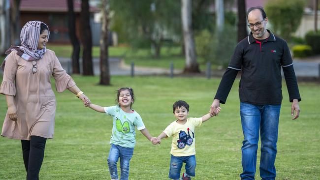 Afghan refugees Jawid and his wife Nazifa with their children Marwa, 3, and Hamza, 20 months, in a local park not far from the northern suburbs home they are temporarily occupying through Anglicare as they find their feet. Picture Mark Brake